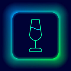 Glowing neon line Wine glass icon isolated on black background. Wineglass sign. Colorful outline concept. Vector