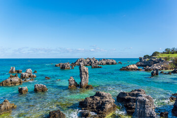 Tobacco Bay's Coastal Charm: St. George's, Bermuda; where sturdy rocks frame azure waters, a...