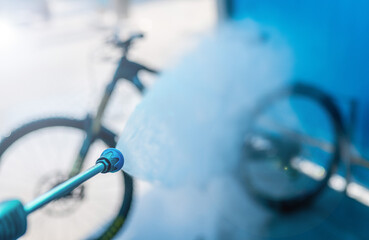 bicycle wash - with spray machine - bike wash 