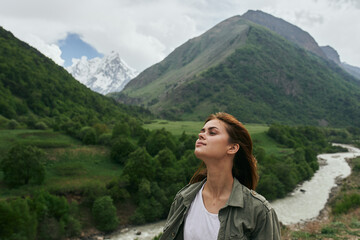 Naklejka na ściany i meble woman hiker mountains landscape travel freedom fresh air