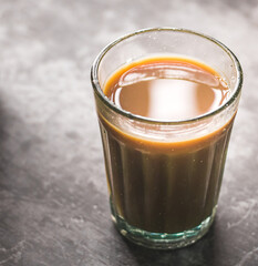 glass coffee cups during the day