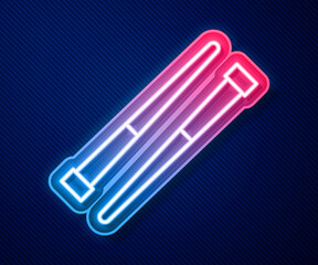 Naklejka premium Glowing neon line Food chopsticks icon isolated on blue background. Wooden Korean sticks for Asian dishes. Oriental utensils. Vector