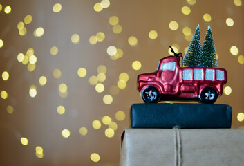  Nice Christmas background decorated with gifts, vintage car and background lights for product decoration or congratulation montage.