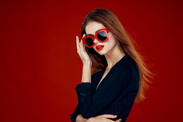 glamorous woman wearing sunglasses red lips posing close-up
