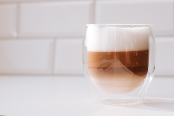 Closeup of coffee in a double glass