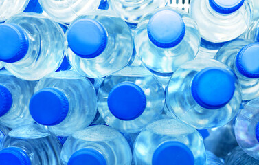  Many bottles of water in the store.