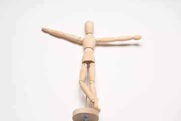design wooden mannequin object toy posing light background
