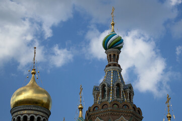 Fototapeta na wymiar A close-up view of the domes of the Museum of the Savior on Spilled Blood in St. Petersburg is a museum and a monument of Russian architecture. 