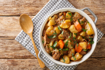 Scottish Stovies traditional Comfort Food with potatoes, meat and other vegetables close up in the...