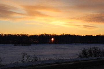 amazing colorful sunrise in winter - the sun rises