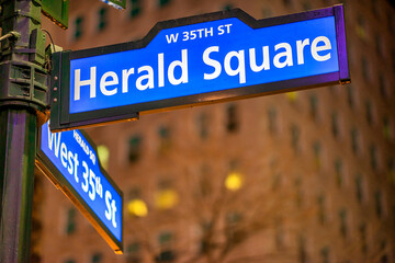 Herals Square street sign at night in New York City - Manhattan.
