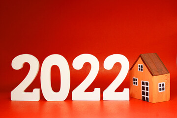 New House 2022 on ฺRed  background - new year trend 2022 - red pattern business concept of Real Estate, Home Property for Sale and rent - copy space , promotion design advertise