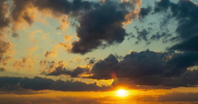 Timelapse of a beautiful sky with clouds at sunset