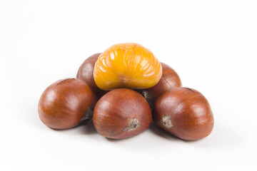 Close-up Chestnuts with peeled  isolated on white background.