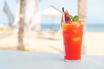 fruit punch with sea beach background
