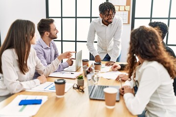 Group of business workers smiling happy working at the office.