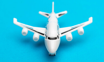 Airplane toy on blue background.