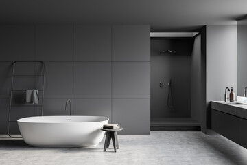 Fototapeta na wymiar Modern grey bathroom with empty tiled wall