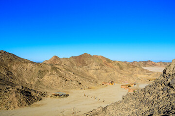 Fototapeta na wymiar View on bedouin village in Arabian desert not far from the Hurghada city, Egypt