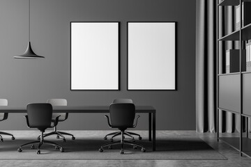 Two canvases in dark grey meeting room