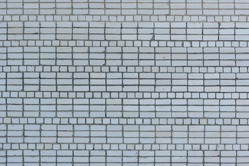 White brick wall of the modern building for background