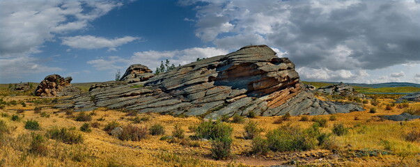 Eastern Kazakhstan. Bayanaul natural mountain Park in the middle of endless steppes. The age of the...