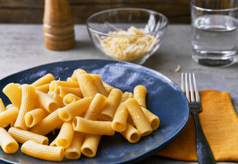  Plate of macaroni italian pasta on a concrete surface