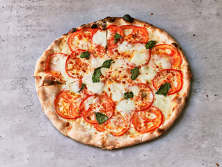  Delicious italian pizza on a concrete surface