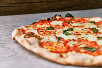  Delicious italian pizza on a concrete surface