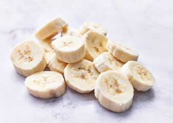  Slices of banana on a marble table