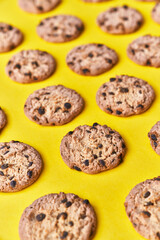  Delicious chocolate cookies on a yellow background