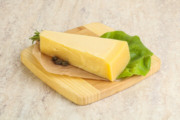 Traditional delicous Parmesan cheese over borad