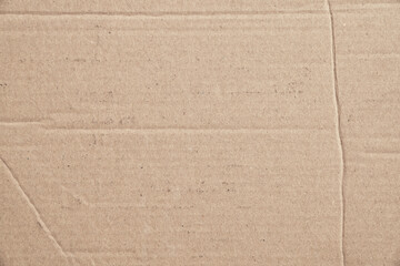 Fototapeta premium Rustic brown paperboard. Rough cardboard kraft texture