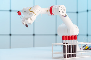 Robot arm with test tube for biological experiments in laboratory