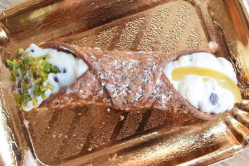 sicilian cannolo with pistachios and candied fruit