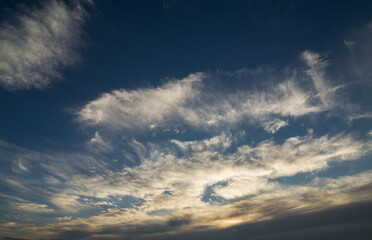 Naklejka na ściany i meble Clouds in the evening sky.