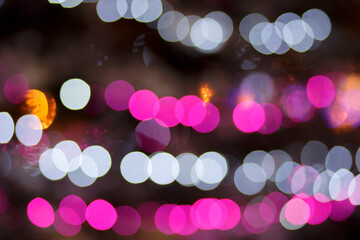 Christmas blurred background with bokeh. Unfocused background with Christmas lights. Background. Festive background with unfocused colored bokeh lights