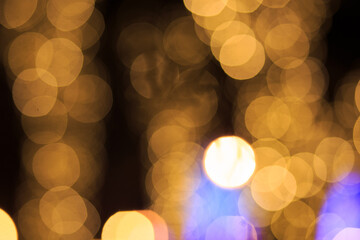 Christmas blurred background with bokeh. Unfocused background with Christmas lights. Background. Festive background with unfocused blue bokeh lights