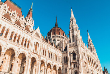 Hungarian Parliament building in Budapest at the daylight. 
Gothic architecture exterior. Tourist destination. 