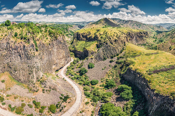 Car road and a pedestrian path leading to majestic gorge of Azat river canyon - a Symphony of...