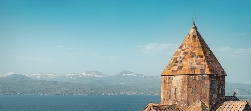 Close-up of the dome of the ancient Armenian Church in the Medieval monastery complex Sevanavank near Lake Sevan.