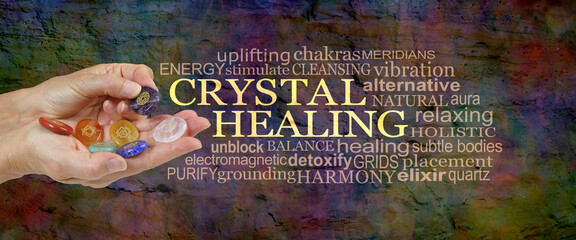 Chakra Crystal Healing word cloud - female crystal therapist offering a chakra etched stone from a...