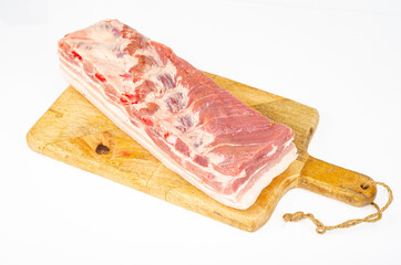 Piece of raw pork belly, fresh meat for cooking. Studio Photo