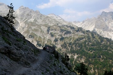 Fototapeta premium Beautiful mountain views on trail from Theth Valley to Valbona Valley in Albanian Alps. It is one of the most beautiful high mountain trails.