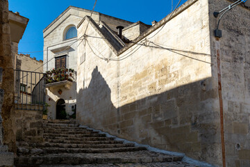Narrow street in the historic City of Materia in southern Italy. Matera was in 2019 the European Capital of Culture