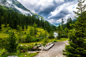 Fototapeta na wymiar Alpine Landscape With Mountain River In Deferegental In Tirol In Austria