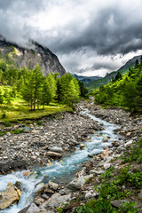 Valley With Alpine River To Mountain Peak Grossglockner In Kals In Austria