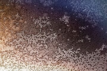 Obraz premium snowflakes on the window on a dark night - New Year's background