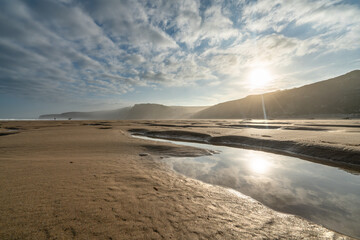 Watergate Beach at sunrise in Cornwall. UK