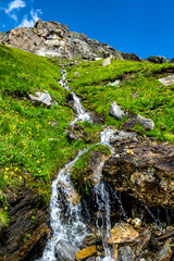 Mountain Creek With Freshwater Waterfall In National Park Hohe Tauern In Tirol In Austria